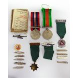 A SECOND WORLD WAR PAIR OF MEDALS ATTRIBUTED TO PRIVATE W.H. SAUNDERS, ROYAL ARTILLERY comprising