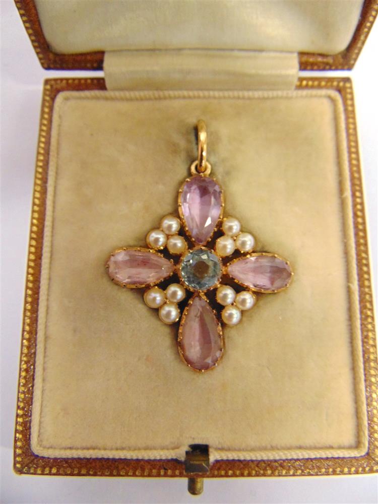 A PINK TOPAZ AQUAMARINE AND SPLIT PEARL CRUCIFORM PENDANT circa 1900, in a fitted Carringtons