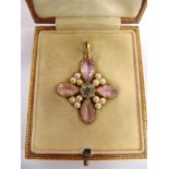 A PINK TOPAZ AQUAMARINE AND SPLIT PEARL CRUCIFORM PENDANT circa 1900, in a fitted Carringtons