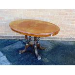 A VICTORIAN OVAL WALNUT LOO TABLE  with marquetry decoration, 106cm long 73cm wide 66cm high