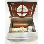 A SIRRAM PICNIC SET FOR TWO circa 1920s, comprising a large aluminium sandwich tin and container,