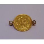 AN 1877 20 FRANCS COIN converted to a brooch, flanked on either side by a pearl (untested and
