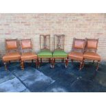 A SET OF FOUR VICTORIAN CARVED OAK FRAMED DINING CHAIRS,  together with a further pair of