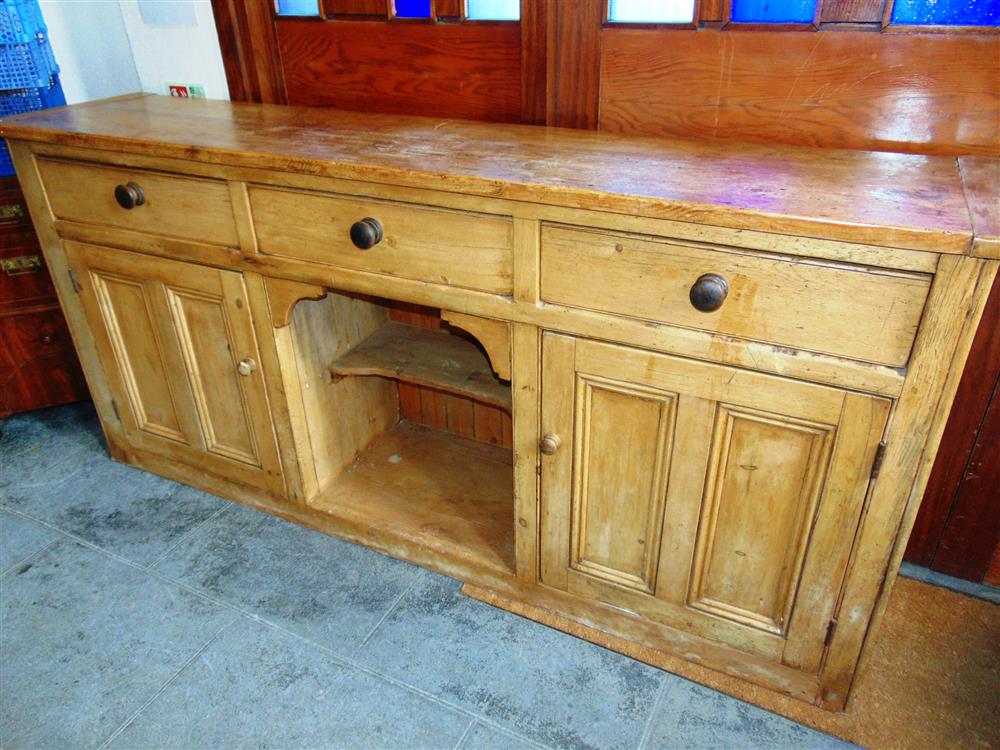 A LARGE STRIPPED PINE DRESSER BASE,  fitted with three drawers over cupboard and pot shelf, 213cm - Image 2 of 3