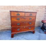 A VICTORIAN MAHOGANY CHEST OF TWO SHORT AND THREE LONG DRAWERS  on bracket feet, 104cm wide 55cm