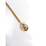 A 9 CARAT GOLD SAINT CHRISTOPHER PENDANT on a 9 carat gold micro belcher chain, 51cm long, 10.5