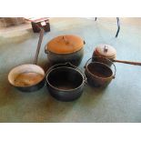 A MIXED COLLECTION OF CAST IRON COOKWARE  including T Holcroft & Sons 4 gallon oval pot with swing