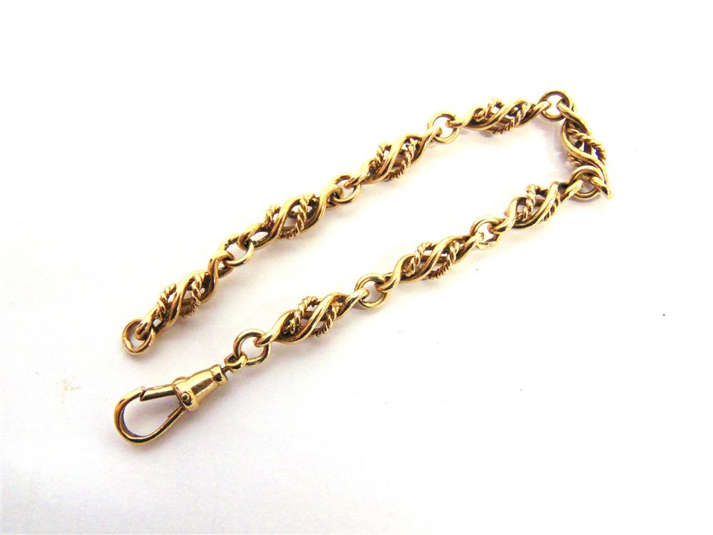 A BRACELET  of fancy links, stamped '9kt' to the swivel catch, 19cm long, 14g gross