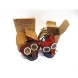TWO SECOND WORLD WAR BRITISH 'MICKEY MOUSE' GAS MASKS each boxed (both with wear / tears to red