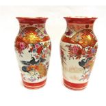 A LARGE PAIR OF JAPANESE KUTANI VASES of baluster form, painted with peacocks and blossoming