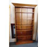 A STRIPPED PINE OPEN BOOKCASE,  fitted with five adjustable shelves, 97.5cm wide 24cm deep 181cm