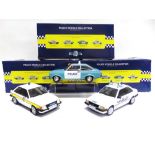 THREE MODEL ICONS 1/18 SCALE MODEL BRITISH POLICE CARS comprising No.999002, Ford Escort Mk II 1.1