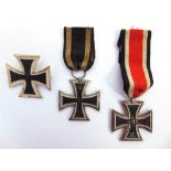 THREE GERMAN IRON CROSSES comprising a 1914 1st Class; 1914 2nd Class; and 1939 2nd Class.