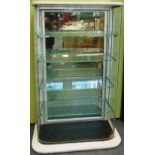 AN EARLY 20TH CENTURY FLOOR-STANDING SHOP DISPLAY CABINET with rounded front corners and a