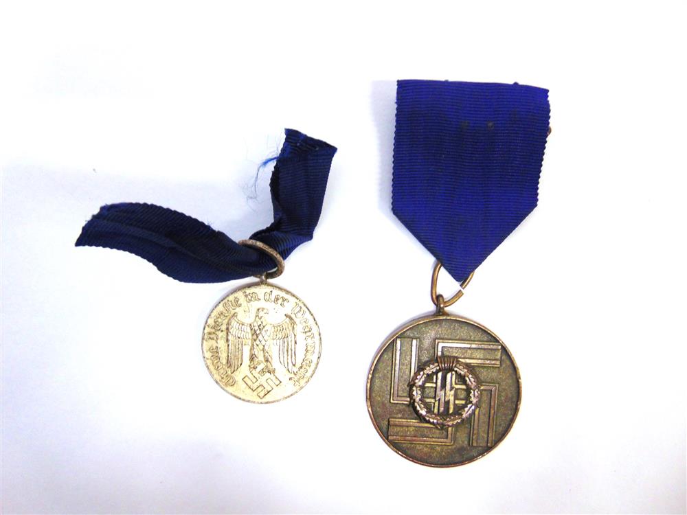 A GERMAN SS LONG SERVICE AWARD 1938 (S.S. DIENSTAUZEICHNUNGEN) Bronze Medal for 8 Years; and an