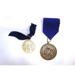 A GERMAN SS LONG SERVICE AWARD 1938 (S.S. DIENSTAUZEICHNUNGEN) Bronze Medal for 8 Years; and an