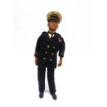 AN ENGLISH COMPOSITION 'ADMIRAL JELLICOE' CHARACTER DOLL with a moulded and painted head and