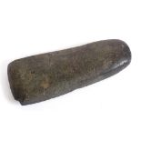 A MAORI GREENSTONE AXE HEAD of rounded oblong form, inscribed to one side 'Mangatea', 13.5cm long.