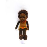 A NORAH WELLINGS 'SOUTH SEAS ISLANDER' TYPE CLOTH DOLL with tightly curled brown hair, inset brown