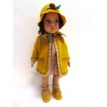 A LENCI STYLE FELTED CLOTH GIRL DOLL with brown hair and painted facial features with side