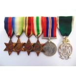 A SECOND WORLD WAR GROUP OF SIX MEDALS ATTRIBUTED TO LIEUTENANT COMMANDER J.D. SAUNDERS, ROYAL NAVAL