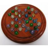 THIRTY-TWO LATE 19TH & EARLY 20TH CENTURY HAND-MADE MARBLES including micas, of similar sizes,