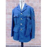 A SECOND WORLD WAR R.A.F. TUNIC, TROUSERS & FORAGE CAP the tunic dated 1945, with shoulder flashes