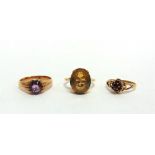 A 9 CARAT GOLD GARNET CLUSTER RING with two other stone set dress rings, 10.5g gross