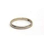 A WEDDING RING stamped 'Platinum', finger size O, 3.5g gross