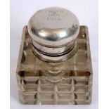 19TH CENTURY - CHINA BOXER REBELLION - A LARGE HEAVY CUT-GLASS INKWELL  the silver top inscribed '