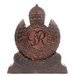 SECOND WORLD WAR - A CARVED WOODEN ROYAL ENGINEERS DEVICE  the 19cm high plaque mounted on a base