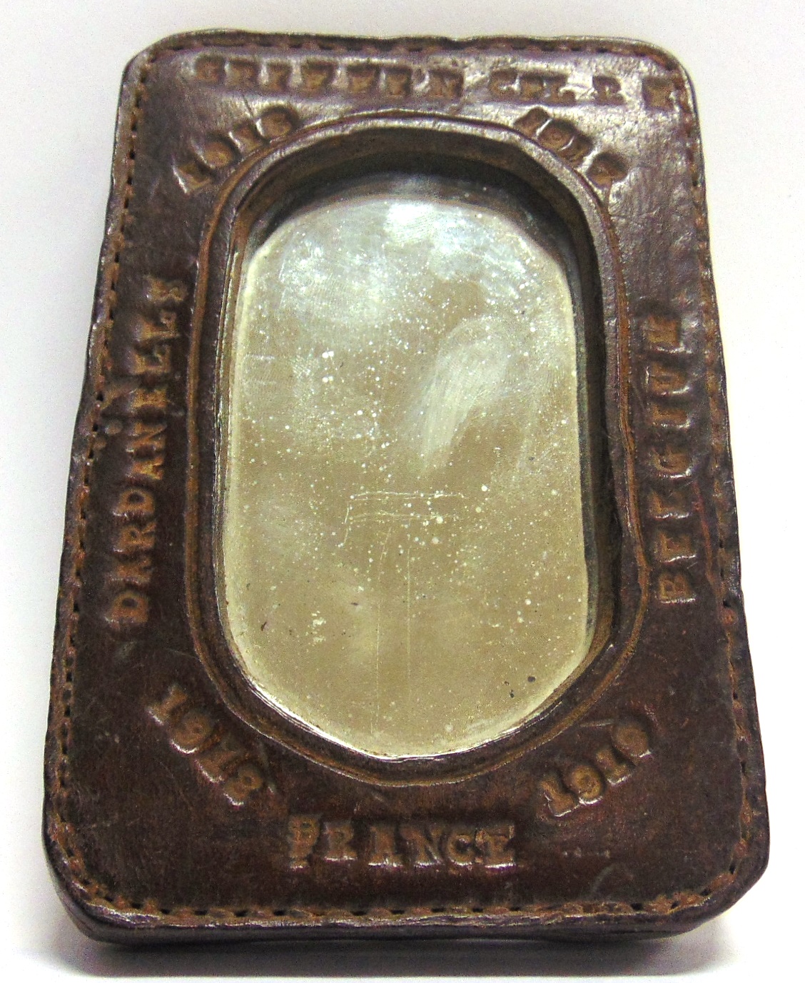 GREAT WAR - A PERSONALISED HANDMADE LEATHER FRAMED SHAVING MIRROR probably made by a harness