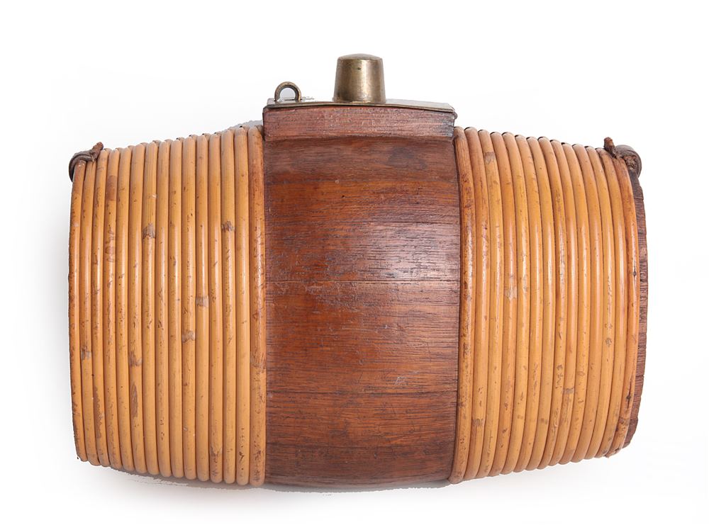 19TH CENTURY - CRIMEA - A SPIRIT FLASK  made from coopered oak, with a cane cover and brass hinged