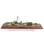 SECOND WORLD WAR - A BRITISH SCRATCH-BUILT TIN MODEL OF 'H.M.S. SHEARWATER'  in camouflage