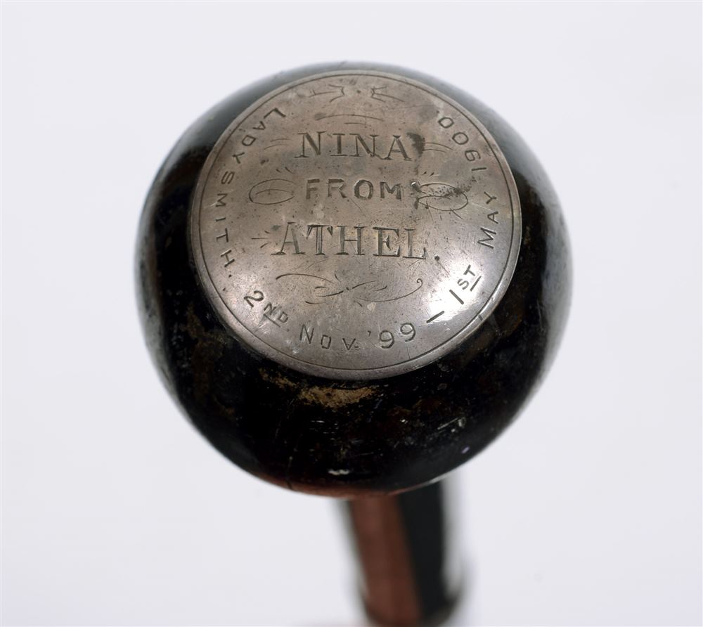 ANGLO-BOER WAR 1899-1902 - A SILVER MOUNTED EBONISED WALKING CANE  the bulbous grip mounted with