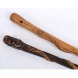 GREAT WAR - A TRADITIONAL FRENCH CARVED 'TWISTED SNAKE' WALKING CANE  together with another,