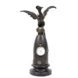 19TH CENTURY - A FINE FRANCO-PRUSSIAN WAR CONICAL IRON PROJECTILE WATCH STAND  with lead inlaid