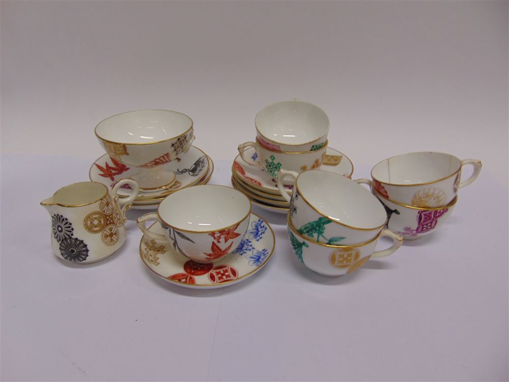 A ROYAL WORCESTER AESTHETIC STYLE PART TEA SERVICE  decorated with Mon and other Japanese motifs