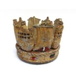 AN UNUSUAL CAST ALUMINIUM NAVAL CROWN early 20th century, set with an alternating band of ship's