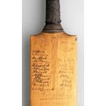 A profusely signed 1930s cricket bat, signed in ink to the face and the reverse, two England teams