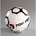 A football signed by Pele, signed at the World Travel Market in London in 1985 when Pele was an