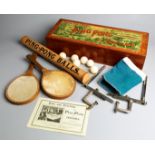 A mahogany boxed table tennis set, THE NEW TABLE GAME OF PING PONG OR GOSSIMA, by J. Jaques & Son,
