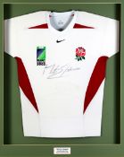 A signed Martin Johnson white England 2003 Rugby World Cup shirt, signed in black marker pen,