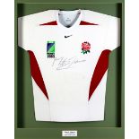 A signed Martin Johnson white England 2003 Rugby World Cup shirt, signed in black marker pen,