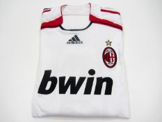 Paolo Maldini: a white AC Milan No.3 UEFA Champions League away jersey season 2006-07, long-sleeved,