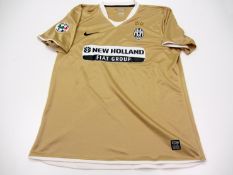 Gianluigi Buffon: a gold Juventus No.1 Serie A goalkeeping jersey season 2009-10, short-sleeved,