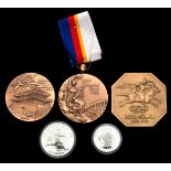 A group of three cased medals relating to the Seoul 1988 Olympic Games, i) a prize medal in