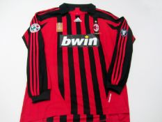 Alessandro Nesta: a signed red & black striped No.13 AC Milan jersey season 2007-08, signed on the