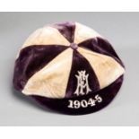 A purple & white quartered Football Association international trial cap season 1904-05,
with F.A.