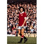 Two George Best-signed colour photographic prints,
Best in action for Manchester United,